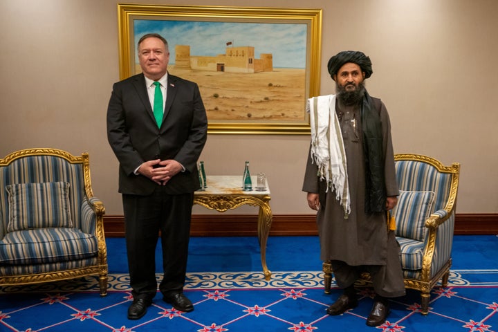 U.S. Secretary of State Mike Pompeo meets with the Taliban political affairs chief Mullah Abdul Ghani Baradar in Doha, Qatar, on Sept. 12, 2020. Pompeo recently said that the Biden administration had "failed" on Afghanistan.