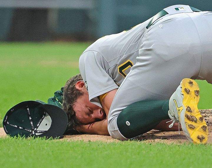 Photos: A's Bassitt returns to mound weeks after being hit in face with  line drive