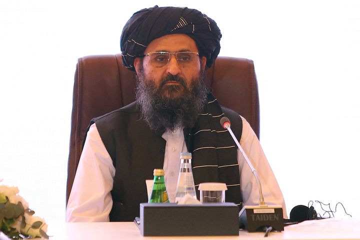 The leader of the Taliban negotiating team Mullah Abdul Ghani Baradar looks on the final declaration of the peace talks between the Afghan government and the Taliban
