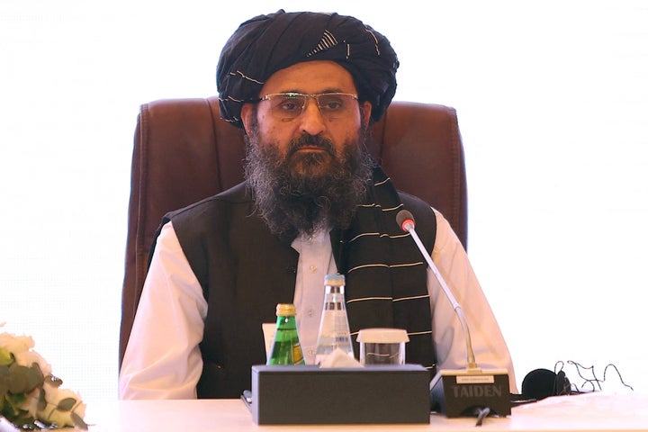 The leader of the Taliban negotiating team Mullah Abdul Ghani Baradar looks on the final declaration of the peace talks between the Afghan government and the Taliban