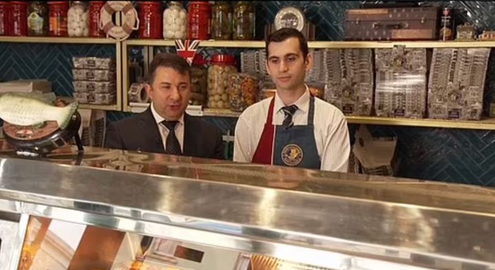 Recep with his son at their business Jack The Chipper