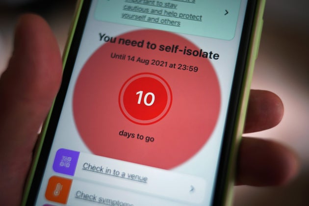 A message to self-isolate is displayed on the NHS coronavirus contact tracing app on a mobile