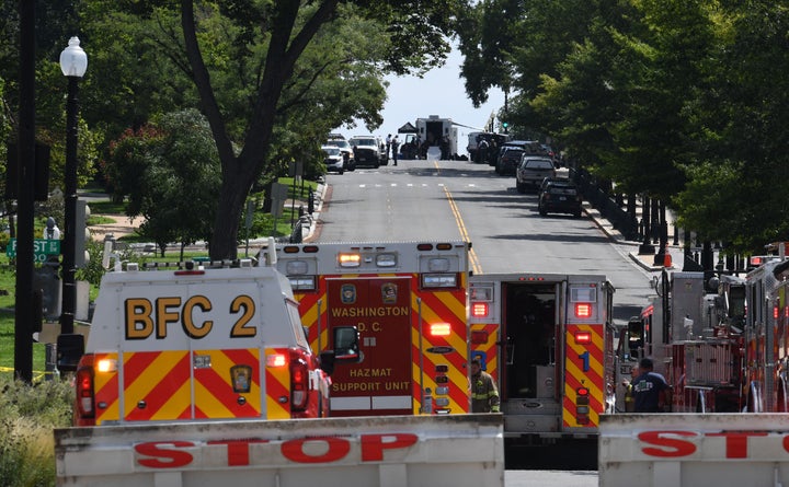 First responders and police investigate a bomb scare near the U.S. Capitol and Library of Congress in Washington on Thursday.
