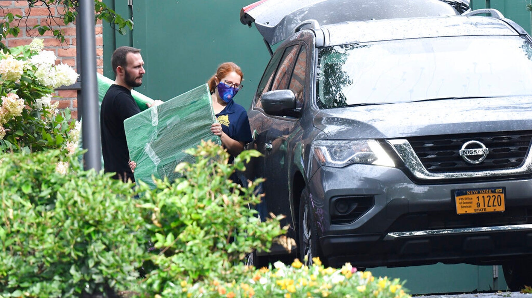 Movers Outside New York Governor's Mansion Helping Andrew Cuomo Leave Office