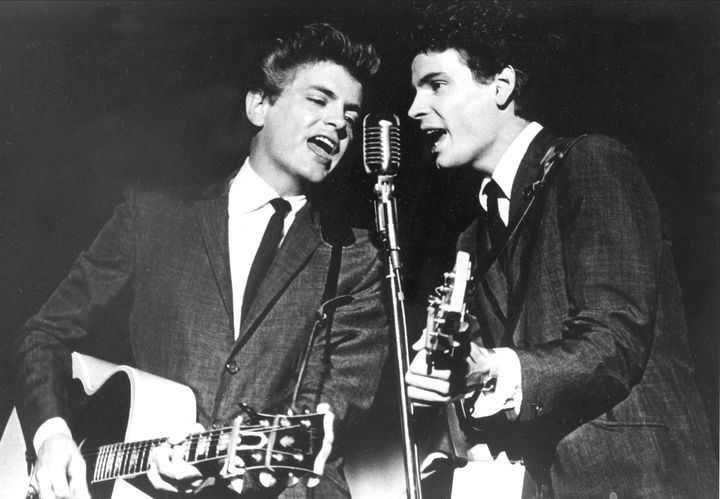 In this July 31, 1964 file photo, the Everly Brothers, Phil, left, and Don, perform on stage. (AP Photo, File)