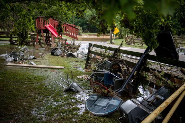 Debris from flooding is strewn along Sam Hollow Road following heavy rainfall on Saturday, Aug. 21, 2021, in Dickson, Tenn. (Josie Norris/The Tennessean via AP)