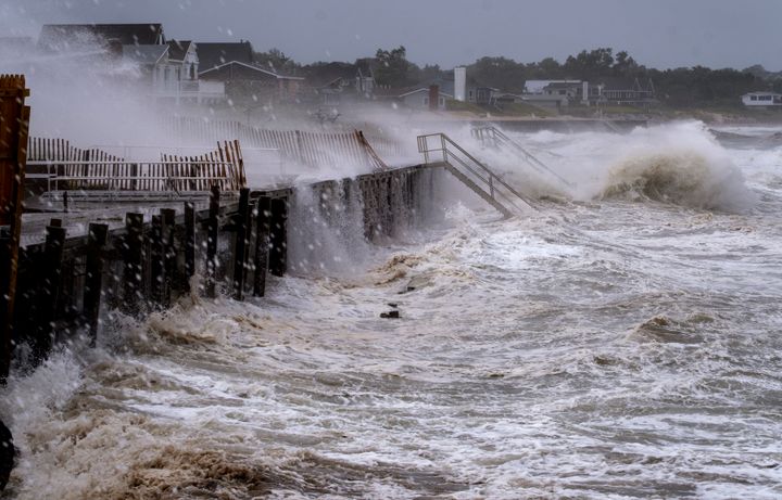 Waves pound a seawall in Montauk, N.Y., Sunday, Aug. 22, 2021, as Tropical Storm Henri affects the Atlantic coast. (AP Photo/Craig Ruttle)
