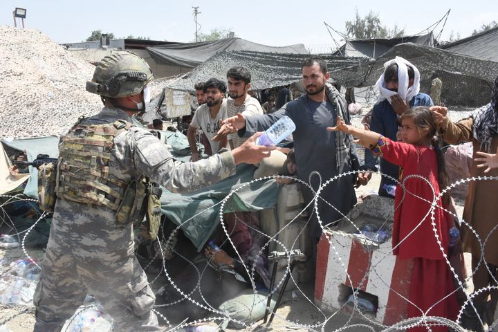 Soldiers of the Turkish Task Force in Afghanistan are on duty in and around Hamid Karzai International Airport to help people