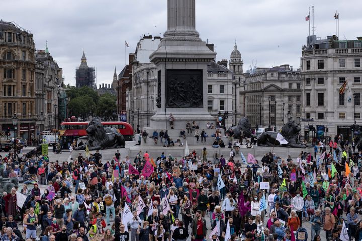 Extinction Rebellion protesters gather in Trafalgar Square on August 23, 2021