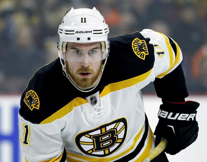 In this Jan. 13, 2016, file photo, Boston Bruins' Jimmy Hayes looks on during an NHL hockey game against the Philadelphia Flyers in Philadelphia. Hayes, who won a hockey national championship at Boston College and went on to play seven seasons with four teams in the NHL, has died. He was 31. The cause of death was not immediately available, according to the Boston Globe.