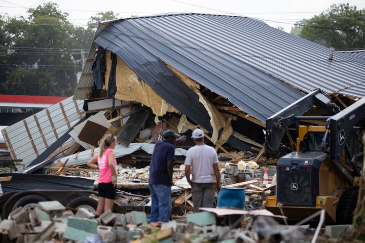 Heavy rains on Sunday caused flash flooding in central Tennessee, leaving at least 22 people dead and more than two dozen mis
