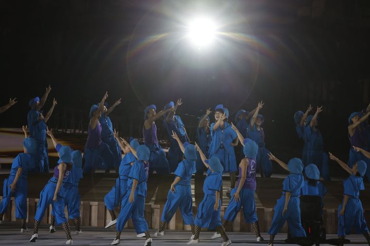 TOKYO, JAPAN - AUGUST 24: Performers dance during the opening ceremony of the Tokyo 2020 Paralympic Games at the Olympic Stadium on August 24, 2021 in Tokyo, Japan. (Photo by Tasos Katopodis/Getty Images)