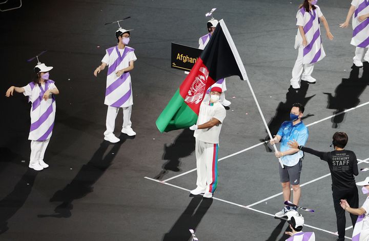 Tokyo 2020 Paralympic Games - The Tokyo 2020 Paralympic Games Opening Ceremony - Olympic Stadium, Tokyo, Japan - August 24, 2021. Afghanistan flag is paraded during the opening ceremony REUTERS/Marko Djurica