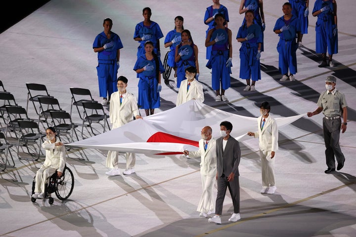 The Japanese flag is carried into the stadium during the opening ceremony of the Tokyo 2020 Paralympic Games at the Olympic Stadium on Aug. 24, 2021 in Tokyo.