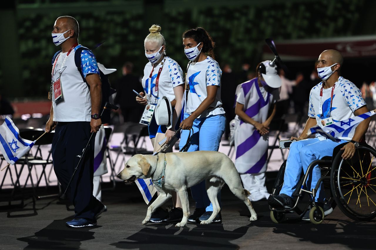 Athletes from Team Israel enter the stadium during the parade of athletes during the opening ceremony of the Tokyo 2020 Paralympic Games.