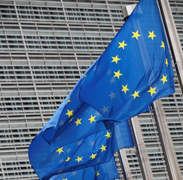 EU flags are seen outside the EU Commission on the day of the EU summit in Brussels, Belgium, May 24,...