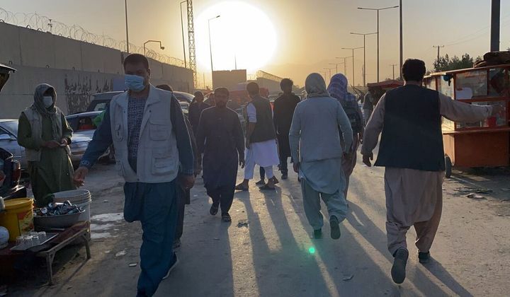 People who want to flee the country continue to wait around Hamid Karzai International Airport in Kabul, Afghanistan on Aug. 25, 2021. 