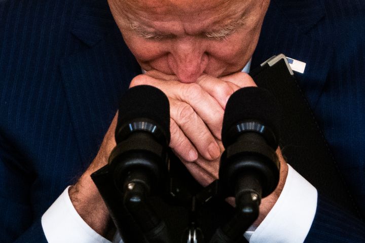 President Joe Biden takes a moment during questioning following his remarks regarding the U.S. service members killed in a te