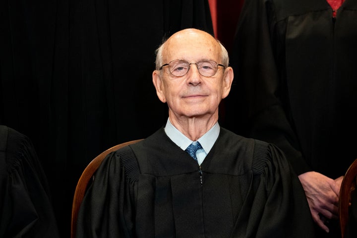 Associate Justice Stephen Breyer sits during a group photo of the Justices at the Supreme Court in Washington, D.C. on April