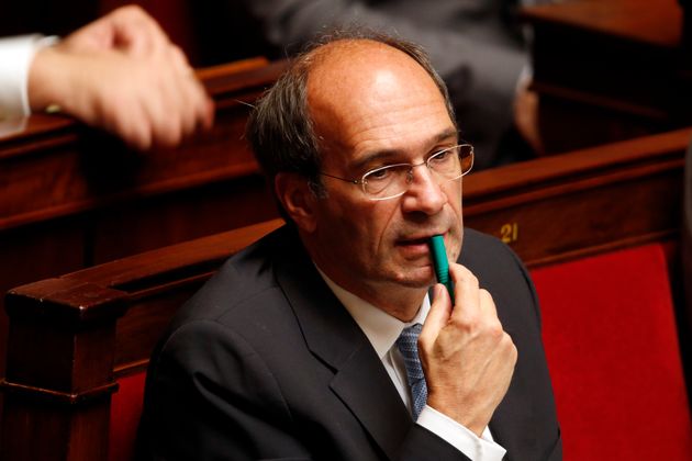 French UMP party deputy Eric Woerth attends the questions to the government session at the National Assembly in Paris October 8, 2013.   REUTERS/Charles Platiau  (FRANCE - Tags: POLITICS)