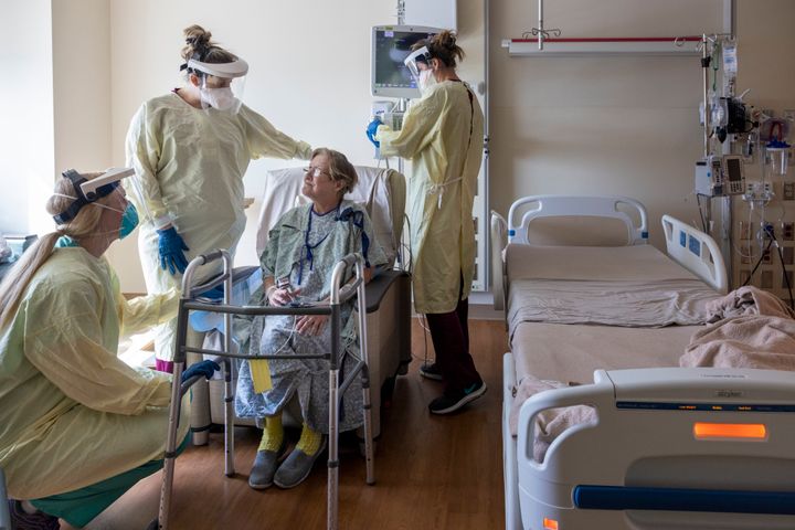 A COVID-19 patient is seen being treated at the Ochsner Medical Center in Jefferson, La. The state's hospitals, already packed with patients from the latest coronavirus surge, are now bracing for a powerful Category 4 hurricane.