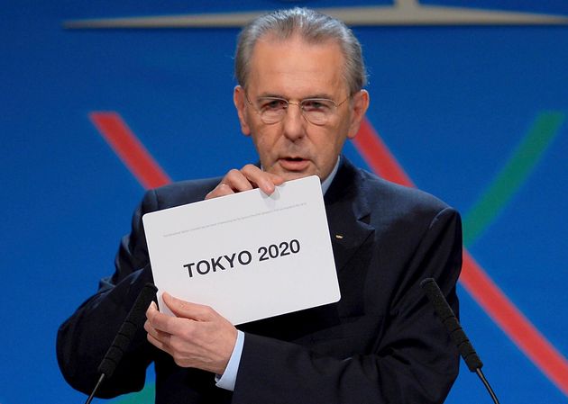 Jacques Rogge President of the International Olympic Committee (IOC) announces Tokyo as the city to host the 2020 Summer Olympic Games during a ceremony in Buenos Aires September 7, 2013.       REUTERS/Fabrice Coffrini/Pool  (ARGENTINA - Tags: SPORT OLYMPICS)