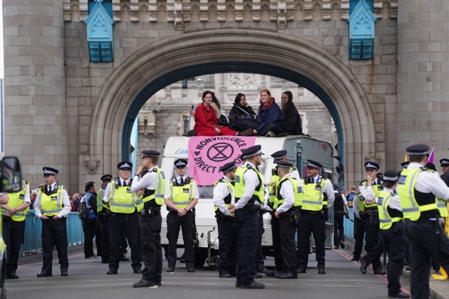 Extinction Rebellion's Sit-Down Protest Blocks Tower