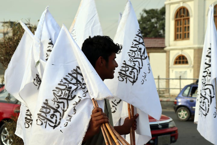 A man sells Taliban flags in Kabul.