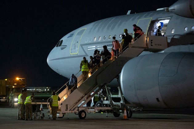 Passengers evacuated from Afghanistan landing at RAF Brize