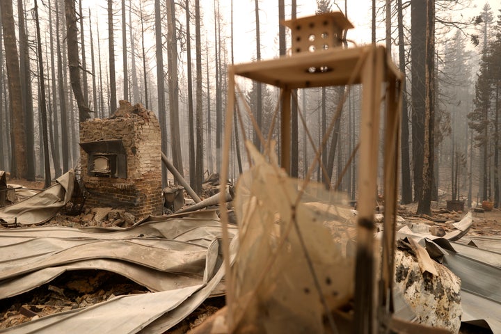 The chimney stands in the burnt remains of a home that was destroyed by the Caldor Fire on August 31, 2021 in Twin Bridges, California.