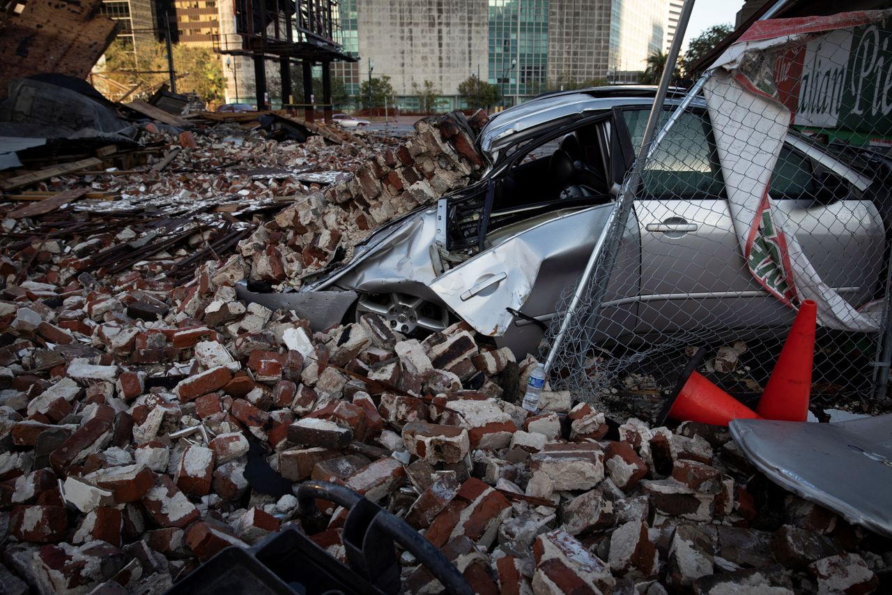A destroyed car is seen under the debris of a building after Hurricane Ida made landfall in Louisiana, US, August 31, 2021.