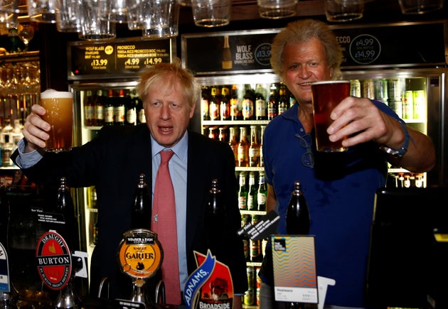 Brexit-backing Boris Johnson and Brexit supporter JD Wetherspoon chairman Tim Martin pictured at Wetherspoons...