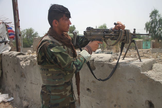 A member of Afghan security force takes part in a military operation against Taliban militants in Alishing...