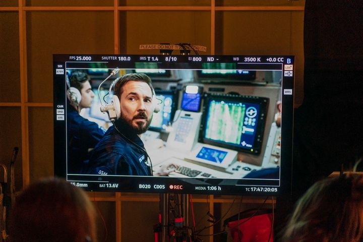 A behind-the-scenes shot of Martin Compston in action