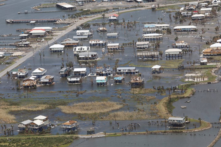 Homes are flooded on Grand Isle, Louisiana, after Hurricane Ida made landfall Sunday.