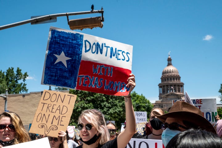 Protesters opposed to the Texas abortion ban march outside the Texas Capitol on May 29.