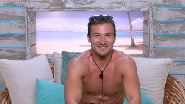 Brett in the Love Island beach