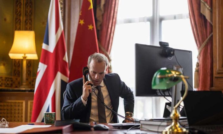 Raab pictured on the phone shortly after Kabul fell, when he had been accused of not making a different phone call