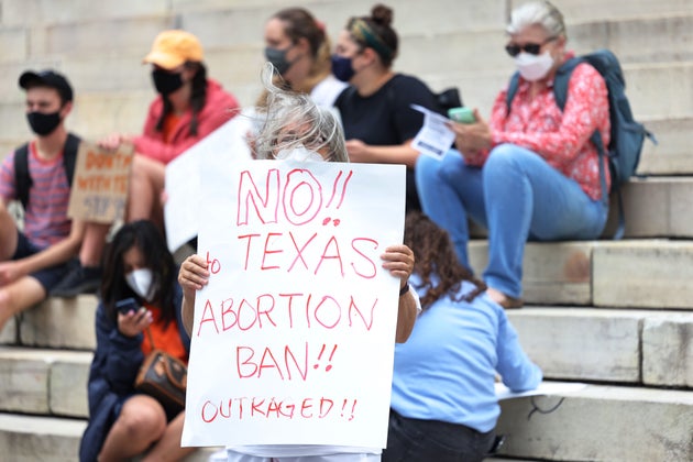 A woman in New York protesting after the new Texas abortion law was