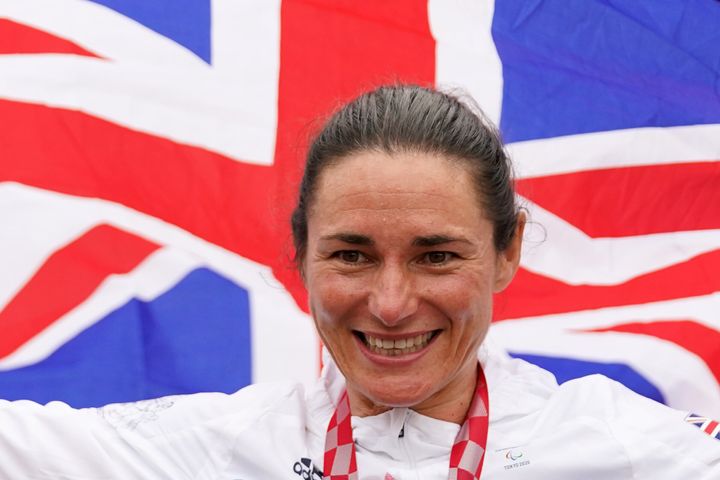Great Britain's Sarah Storey celebrates with the gold medal in the Women's C5 time trial.