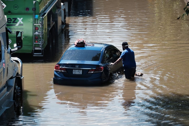 Cars sit abandoned on the flooded Major Deegan Expressway in the Bronx following a night of heavy wind and rain from the remnants of Hurricane Ida on Sept. 2 in New York City.