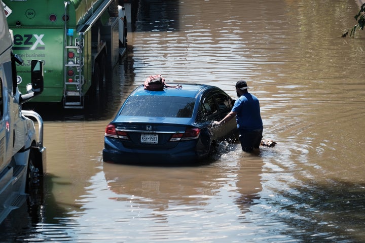 Cars sit abandoned on the flooded Major Deegan Expressway in the Bronx following a night of heavy wind and rain from the remnants of Hurricane Ida on Sept. 2 in New York City. 