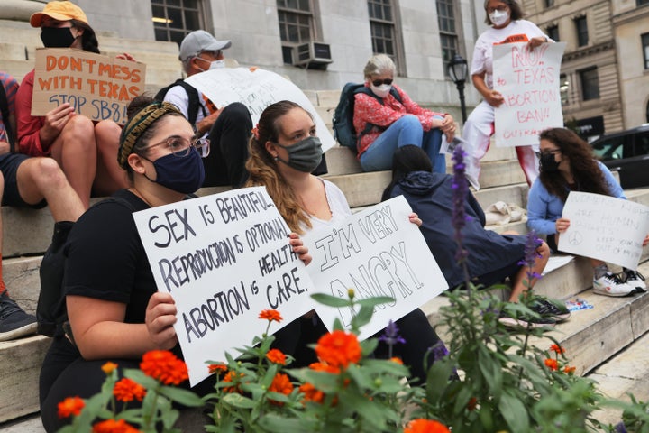 People gather for a reproductive rights rally at Brooklyn Borough Hal 