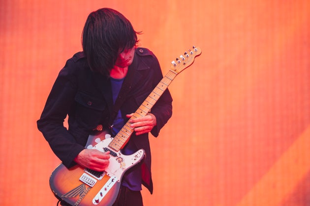 Jonny performing with Radiohead in
