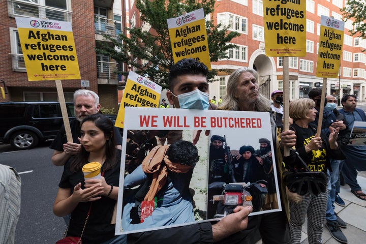 Demonstrators including Afghan people protesting outside the Home Office demanding a safe passage to the UK for the refugees fleeing Afghanistan