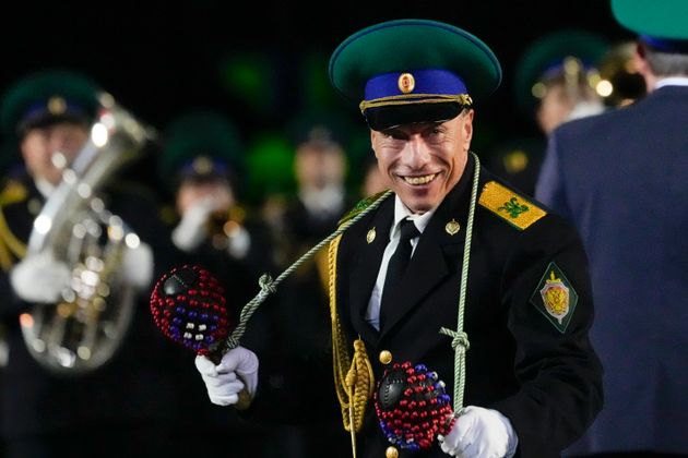 A member of a Russian military band performs during the Spasskaya Tower International Military Music Festival in Red Square in Moscow, Russia, Tuesday, Aug. 31, 2021. (AP Photo/Pavel Golovkin)