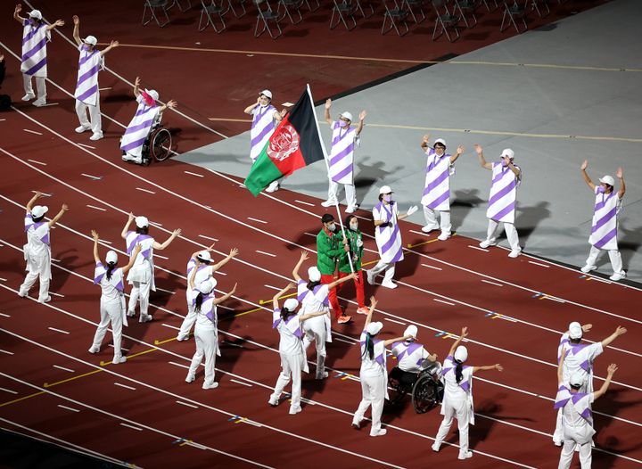 TOKYO, JAPAN - SEPTEMBER 05: The flag of Team Afghanistan is carried during the Closing Ceremony on day 12 of the Tokyo 2020 Paralympic Games at Olympic Stadium on September 05, 2021 in Tokyo, Japan. (Photo by Alex Pantling/Getty Images)