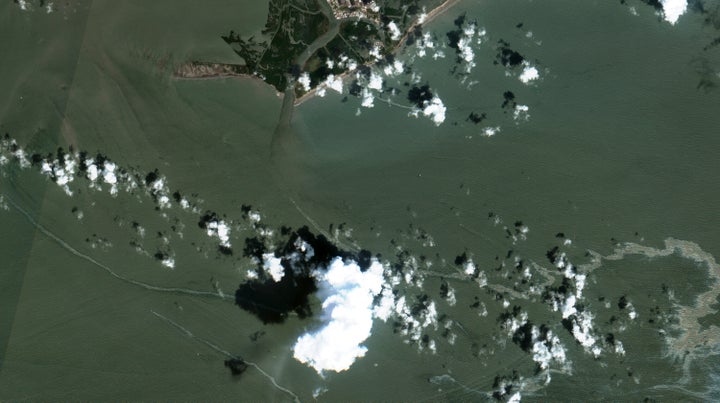 In a satellite image provided by Maxar Technologies, an oil slick is shown on Sept. 2, 2021, south of Port Fourchon, La. The U.S. Coast Guard said Saturday, Sept. 4, that cleanup crews are responding to a sizable oil spill in the Gulf of Mexico following Hurricane Ida.