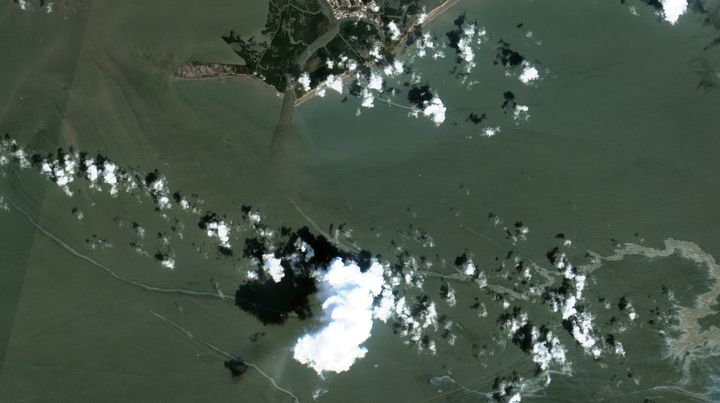 In a satellite image provided by Maxar Technologies, an oil slick is shown on Sept. 2, 2021, south of Port Fourchon, La. The U.S. Coast Guard said Saturday, Sept. 4, that cleanup crews are responding to a sizable oil spill in the Gulf of Mexico following Hurricane Ida. 