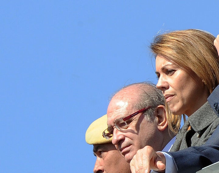 Jorge Fernández Diaz y María Dolores de Cospedal, en un acto militar en 2012.